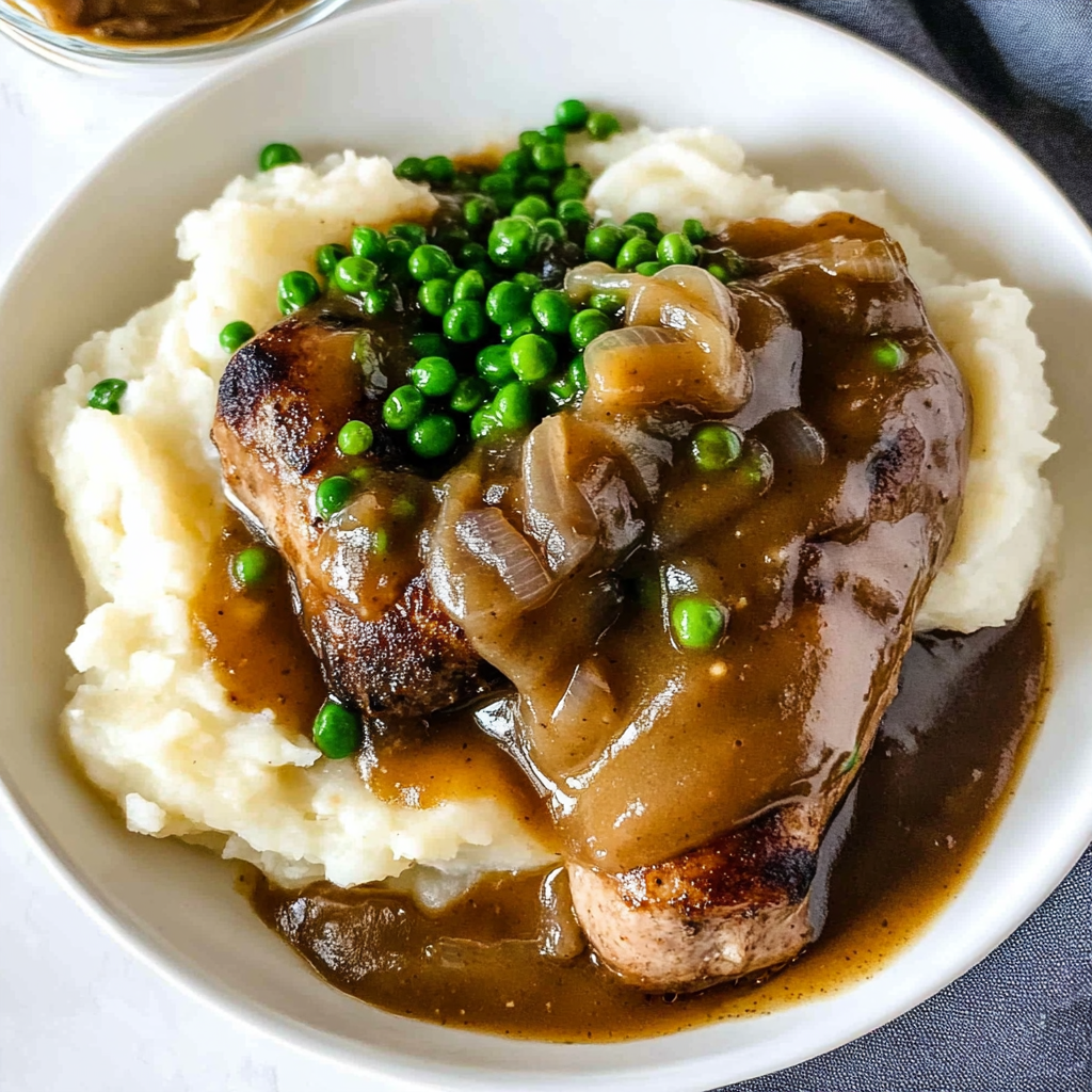 Recipe preparation for Bangers and Mash with Onion Gravy